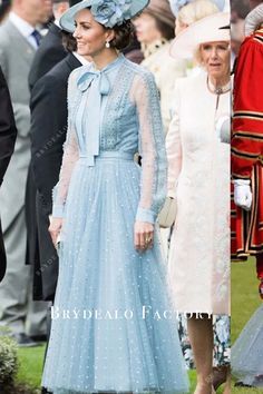 the royal family is dressed in blue and wearing matching outfits for their wedding day, as well as princess charlotte