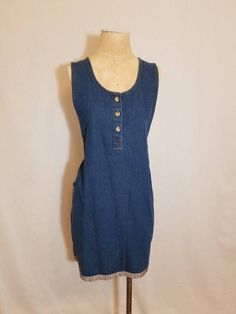 "++ T&R DENIMS DRESS ++ Dark denim jean dress Button down Side pockets Cute flower trim Size XL In wonderful, gently used condition ✂ - - - Measurements laid flat: Pit to pit: 22\" Waist: 22.5\" Hips: 23\" Top to bottom: 35\" Let's be friends! https://www.facebook.com/TheGirlSaidYesVintage Instagram: @TheGirlSaidYes @Covet.Vintage w" Retro Denim Dress With Buttons For Summer, Retro Summer Denim Dress With Buttons, Denim Blue Cotton Dress With Buttons, Retro Buttoned Denim Dress For Spring, Retro Denim Dress With Buttons For Spring, Summer Retro Denim Dress With Buttons, Retro Spring Denim Dress With Buttons, Retro Cotton Denim Dress In Denim Blue, Vintage Denim Top With Buttons For Summer