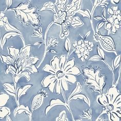 a blue and white wallpaper with flowers on it