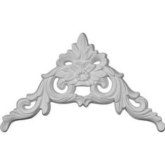 an ornate white shelf bracket on a white background