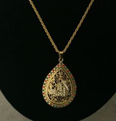 Beautiful gold chain and elegant ALLAH'S pendent and amazing multi stone handwork perfect Islamic jewelry lovers. Gold Spiritual Jewelry With Teardrop Pendant, Gold Spiritual Teardrop Pendant Jewelry, Gold Plated Gemstone Chain Necklace Gift, Gold Plated Teardrop Pendant Chain Necklace As Gift, Gold-plated Teardrop Pendant Jewelry, Spiritual Gold Teardrop Pendant Necklace, Ornate Jeweled Pendant Jewelry, Spiritual Gold Teardrop Necklace, Oval Pendant Chain Necklace For Gifts