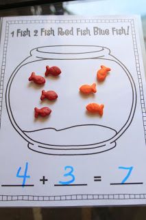 a fish in a bowl is shown with the addition to it's missing numbers