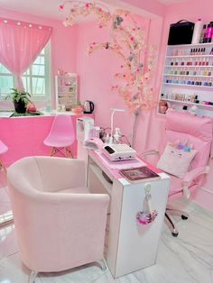 a room with pink walls and furniture in it