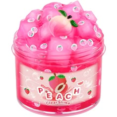 a pink plastic container filled with lots of bubbles and an apple in the top half