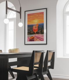 a dining room table with two chairs and a framed window in the wall above it