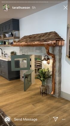 a kitchen with an oven, stove and counter top in the middle of it's room