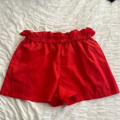 Lightweight Nylon Shorts (Unlined) With Side Pockets. Elastic Waist With Paperbag Style Ruffle. Love Them But I Prefer A Heavier Fabric. I Paid $56 Chic Nylon Shorts For Summer, Chic Summer Nylon Shorts, Red Nylon Bottoms Of Short Length, Red Nylon Shorts, Chic Nylon Shorts, Stretch Red Bottoms For Day Out, Chic Red Beach Shorts, Red High-waisted Shorts With Elastic Waistband, Chic Stretch Red Shorts