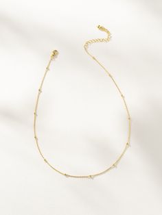 Instead of going round and round with your necklace stack, make this everyday chain necklace your go-to staple. Crafted with a dainty chain and gold bead details, our Satellite Chain Necklace is the ultimate layering necklace. For an effortless everyday look, pair this silver or gold necklace with anything from our Dainty Jewelry Collection. Minimalist Beaded Chain Layered Necklace, Minimalist Everyday Beaded Chain Layered Necklace, Minimalist Ball Chain Necklace For Layering, Minimalist Gold Chain Charm Necklace For Layering, Minimalist Charm Necklaces With Gold Chain For Layering, Minimalist Layered Necklace With Satellite Chain, Dainty Ball Chain Necklace For Everyday, Minimalist Station Necklace With Delicate Chain For Layering, Dainty Everyday Ball Chain Necklace