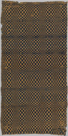 an old black and brown checkered cloth with squares on it, in front of a white background