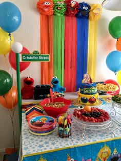 a sesame street birthday party complete with cake and candy