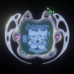 an illuminated object with two cats on it's face and hearts around the eyes