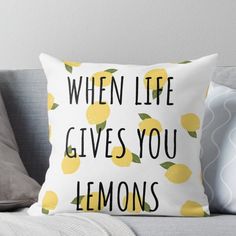 a pillow that says when life gives you lemons