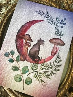 a painting of two cats sitting on top of a crescent moon with mushrooms and leaves