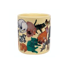 a coffee mug with cats on it