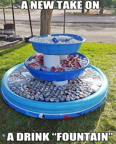 an inflatable water fountain made out of soda cans is shown with the caption saying, such a genius cooler for a party yay or nay?