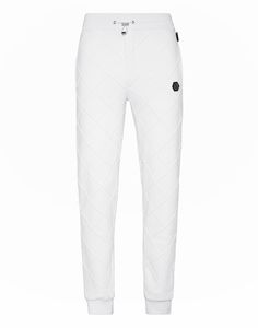 Find PHILIPP PLEIN Jogging Trousers on Editorialist. Style is a note of personality. Check out these cotton fleece joggers with distinctive details. ● Soft cotton fleece ● All-over raised stitching creates a 3D graphic effect ● PP Hexagon on a saffian leather badge sewn on the front, left side ● Two slit pockets ● Drawstring waistband ● Rib knit waistband, and bottom cuffs Fleece Joggers, Philipp Plein, Cotton Fleece, Drawstring Waistband, Jogging, Rib Knit, Trousers