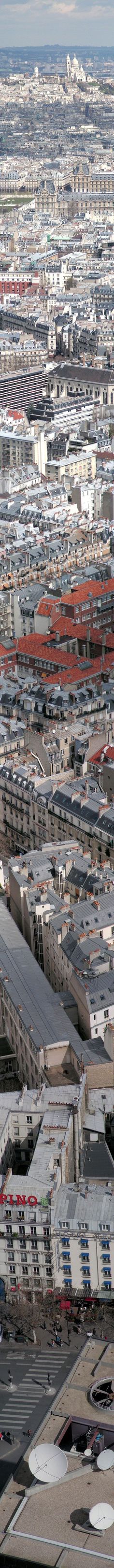 an aerial view of a large city with lots of buildings