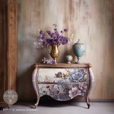 an old dresser with flowers and vases on it in front of a painted wall