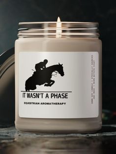 a candle with a horse and rider on it that says, it was't a phase