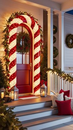 a christmas porch decorated for the holidays