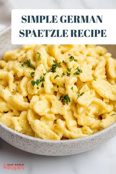 a bowl full of macaroni and cheese with the words simple german spafetze recipe