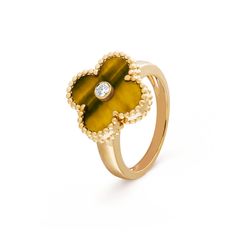 Van Cleef & Arpels - Vintage Alhambra ring - Ring Woman Yellow Gold/Diamond/Tiger's Eye - Faithful to the very first Alhambra® jewel created in 1968, the Vintage Alhambra creations by Van Cleef & Arpels are distinguished by their unique, timeless elegance. Inspired by the clover leaf, these icons of luck are adorned with a border of golden beads. Faithful to the very first Alhambra® jewel created in 1968, the Vintage Alhambra creations by Van Cleef & Arpels are distinguished by their unique, tim Alhambra Ring, Alhambra Pendant, Gold Vans, Van Cleef And Arpels Jewelry, Van Cleef & Arpels, Gold Tiger, Clover Ring, Gold Tiger Eye, Eye Round