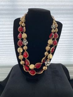 Beautiful vintage necklace is 22 inches long with double strands having glittering red glass and gold-tone balls and chain.  The necklace comes with a bonus bracelet.  The ensemble is perfect as a gift, holiday jewelry, formal wear or adding elegance to a day outfit. Gold Double Strand Jewelry For Festive Occasions, Formal Red Beaded Jewelry, Gold Beaded Necklace For Festive Costume Jewelry, Elegant Beaded Necklace For Holiday, Gold Jewelry For Holiday Party, Elegant Red Necklace For Holiday, Vintage Gold Jewelry For Christmas, Festive Double Strand Gold Necklace, Red Costume Jewelry Necklaces For Party