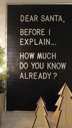 a sign that says dear santa before i explain how much do you know already?