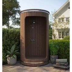 a hot tub sitting on top of a wooden deck