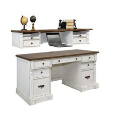 an office desk with two drawers and a laptop