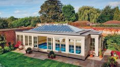 a house with a swimming pool in the backyard