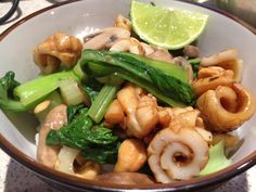 a close up of a bowl of food with broccoli