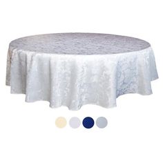 a round table covered in white lace with four different colors on the top and bottom