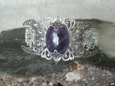 Hey, I found this really awesome Etsy listing at https://www.etsy.com/listing/199964867/amethyst-triple-moon-cuff-bracelet Adjustable Mystical Silver Bracelet, Adjustable Silver Mystical Bracelet, Handmade Silver Amethyst Cuff Bracelet, Bohemian Silver Amethyst Crystal Bracelet, Dragons Breath Fire Opal, Wicca Jewelry, Goddess Bracelet, Amethyst Set, New Plymouth