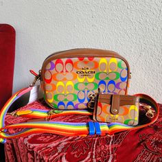 Show Off Your Pride With This Magnificently Stylish Camera Bag & Matching Wallet. Colors Are Bright And Bold And Definitely Stand Out From The Crowd. If You Like It Please Make A Reasonable Offer As I Am Advertising This On Multiple Sites Coach Saddle Bag, Stylish Camera Bags, Coach Crossbody Purse, Black Crossbody Purse, Bags Coach, Vintage Leather Bag, Canvas Crossbody Bag, Fancy Bags, Coach Shoulder Bag