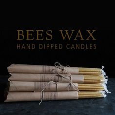 beeswax hand dipped candles are wrapped in brown paper and tied with twine