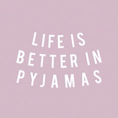 the words life is better in pyjamass on a pale pink background