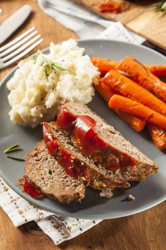 meatloaf, mashed potatoes and carrots on a plate