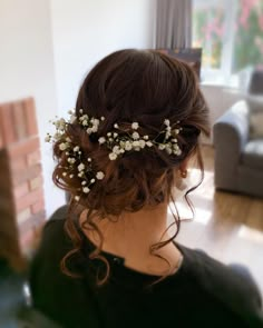 a woman with flowers in her hair