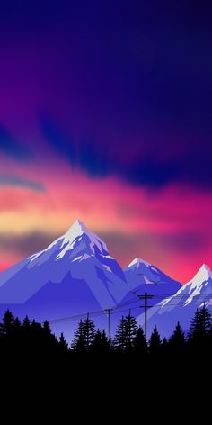 the mountains are silhouetted against a colorful sky