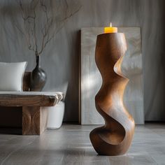 a candle that is sitting on the floor