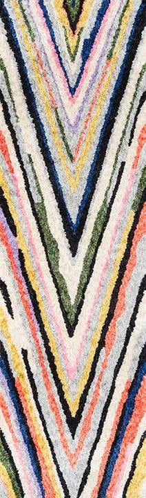 a multicolored rug with wavy lines on it