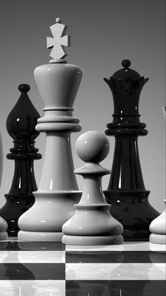 black and white chess pieces on a checkerboard surface with one king in the middle