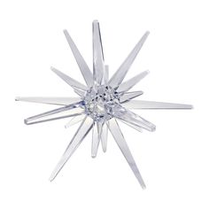 a clear glass star ornament on a white background