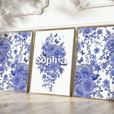 three blue and white floral wall hangings with the word sophia on them