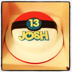 a birthday cake in the shape of a pokeball with an inscription that reads, 13 joseph