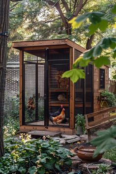 a chicken coop in the middle of a garden with chickens inside and on it's sides