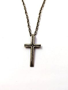 Vintage cross necklace. This necklace measures about 18 inches. Bundle and save. Free shipping on orders over $34.99  Find more necklaces at https://www.etsy.com/shop/FunandFancyVintage?ref=seller-platform-mcnav&section_id=36393637 Please visit our shop for more Fun and Fancy Jewelry!  www.etsy.com/shop/FunAndFancyVintage Vintage Cross Necklace, Earthy Necklace, Necklace Cross, Steel Cross, Bay City, Jewelry Lookbook, Fancy Jewelry, Pendant Necklaces, Halloween Shopping