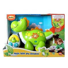 a green and yellow toy with an animal on it's back in a box