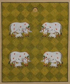 three cows are depicted on a green background